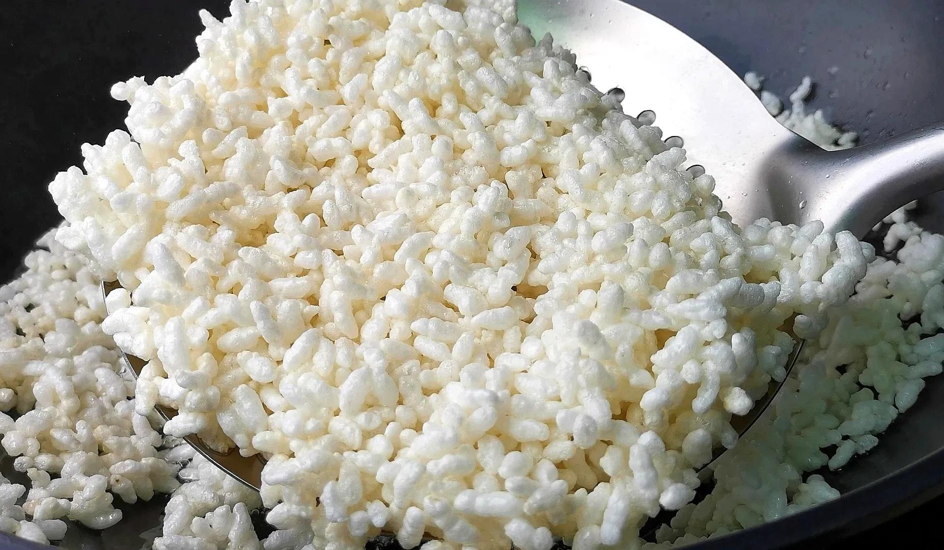 把大米倒进油锅里个个爆开花,简单4步,轻松做成福建的米花糖