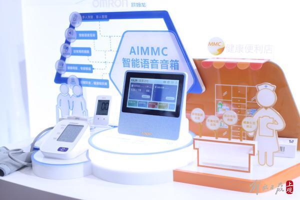 机器人乒乓教练又来进博会了，这次“一对一”变成了“一打二”……