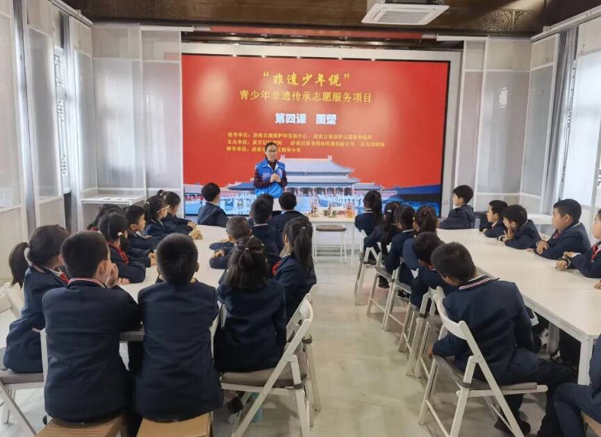 历下区熙华小学向日葵中队传承传统文化(图1)