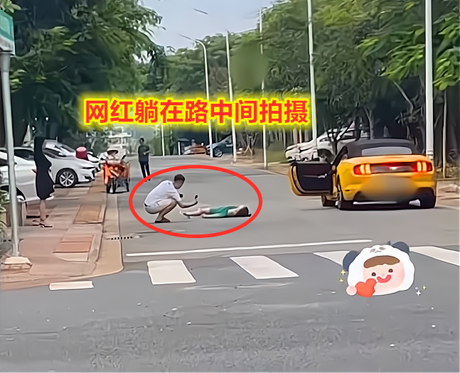 女网红“拍段子”躺马路上发出嚎叫，追逐豪车未果，叉腰站路中央